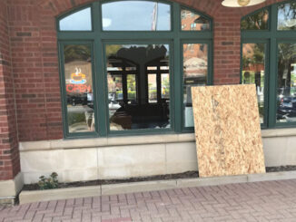 Broken window where burglars hit the downtown Arlington Heights Metra station at 45 West Northwest Highway (PHOTO CREDIT: Jim Emmerson)