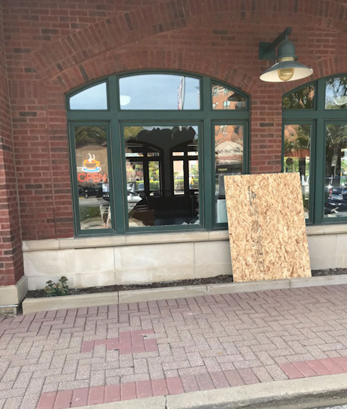 Broken window where burglars hit the downtown Arlington Heights Metra station at 45 West Northwest Highway (PHOTO CREDIT: Jim Emmerson)