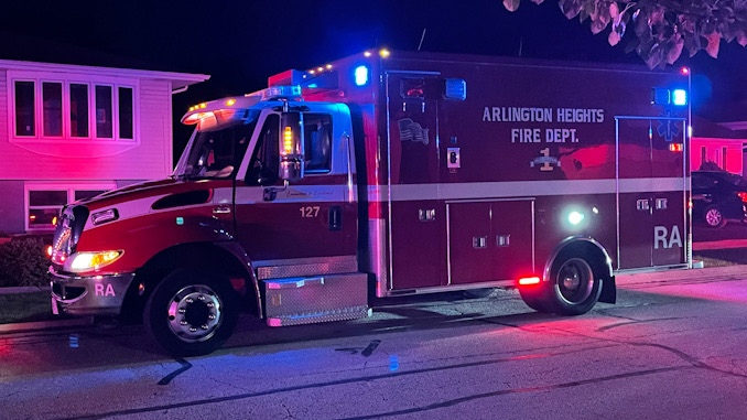 A paramedic crew from Arlington Heights was called to work at the High Grove Lane house fire scene in Palatine in case there were any injuries
