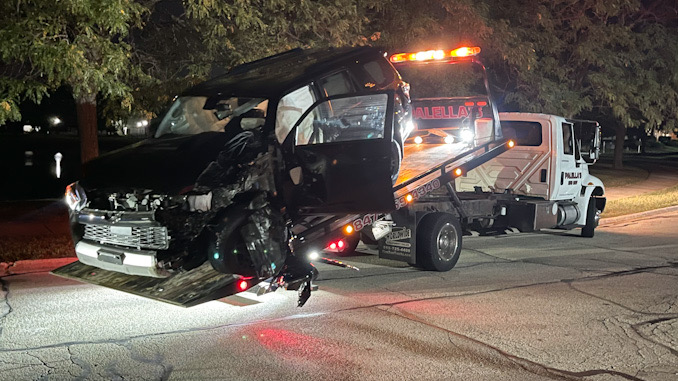 Black Toyota 4Runner crash into a Mack Truck