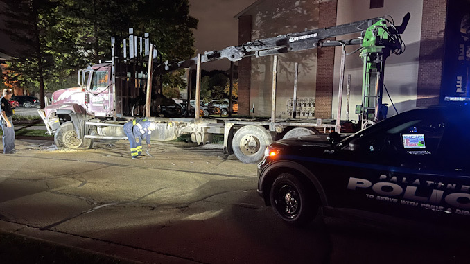 Black Toyota 4Runner crash into a Mack Truck