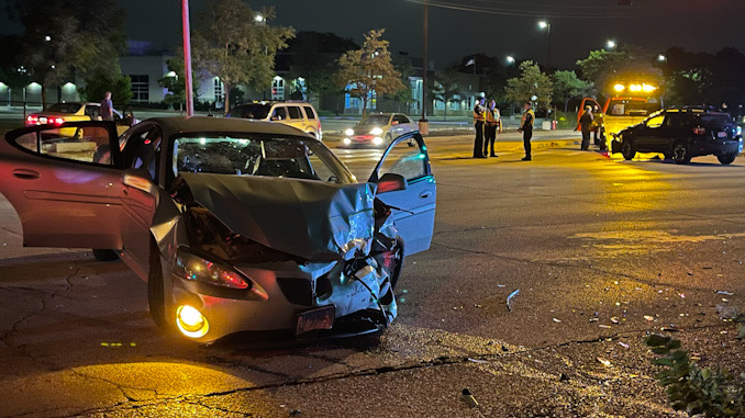 Severely damaged car at a crash scene at Northwest Highway and Euclid Avenue in Arlington Heights