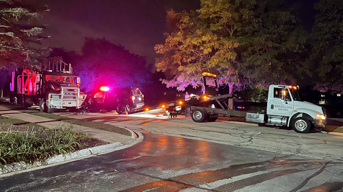 Black Toyota 4Runner crash into a Mack Truck