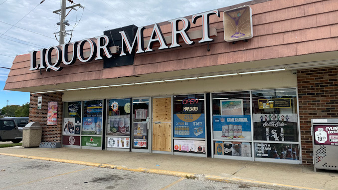 Front glass door smashed at Liquor Mart at 704 East Kensington Road in Arlington Heights