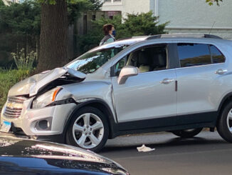 A Chevy Trax with front-end damage was moved to the southbound lanes south of Arlington Heights Road south of Euclid Avenue