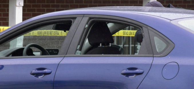 Shot out window in a blue Kia at a fatal shooting scene in Park City