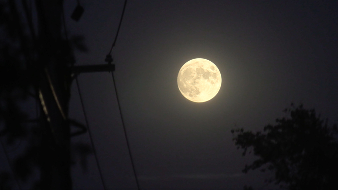 Hunter's Moon Rising over Oakton Street about 6:30 p.m. CDT on Tuesday, October 19, 2021