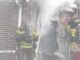 Cutting the garage door out of the way at a house fire on Greenridge Road in Buffalo Grove, Thanksgiving Day, November 25, 2021