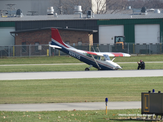 Cessna 172P with a failed landing gear in the grass at Chicago Executive Airport (PHOTO CREDIT: Max Weingardt)