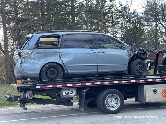 Minivan damaged at the front end and right side after its driver crashed into a freight train traveling southwest on the Canadian National Railway at Gilmer Road near Mundelein (Craig/CapturedNews)