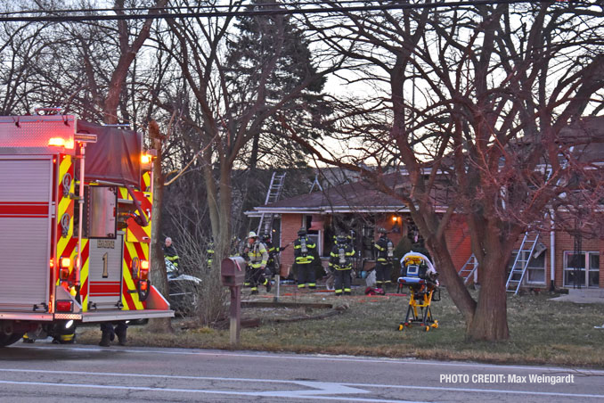 House fire on North East River Road north of Golf Road in DesPlaines (PHOTO CREDIT: Max Weingardt)