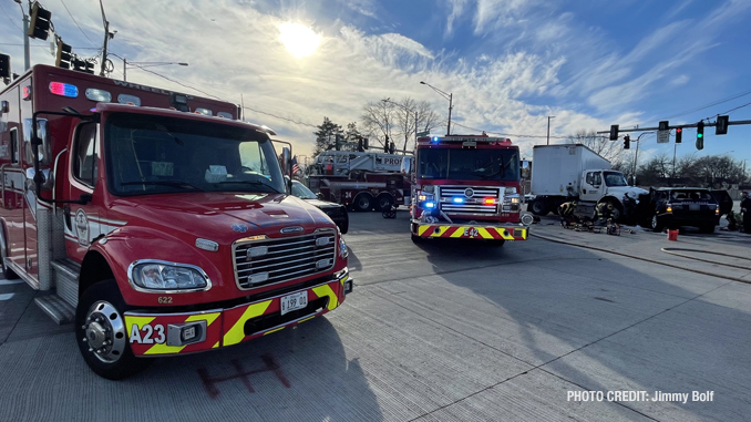 Intersection crash involving a semi-trailer truck and a black Range Rover SUV at Lake Cook Road and Lexington Drive in Wheeling (PHOTO CREDIT: Jimmy Bolf)