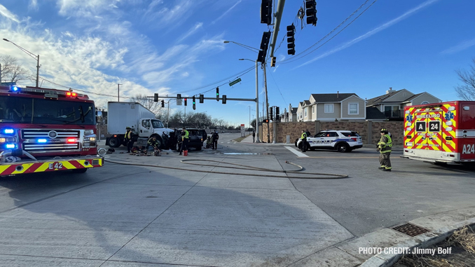 Intersection crash involving a semi-trailer truck and a black Range Rover SUV at Lake Cook Road and Lexington Drive in Wheeling (PHOTO CREDIT: Jimmy Bolf)