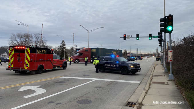 A semi-trailer truck backs off of the UP Northwest line railroad tracks at Arthur, Davis, US 14 grade crossing Wednesday afternoon, December 22, 2021 (PHOTO CREDIT: CARDINAL NEWS)