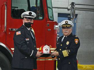 Prospect Heights Fire Protection District Lt. Jason Hardy (left) at his promotion to lieutenant with Fire Chief Drew Smith (SOURCE: Prospect Heights Fire Protection District)