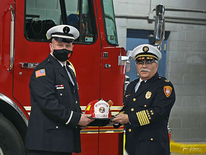 Prospect Heights Fire District Lt. Jason Hardy (left) at his promotion to lieutenant with Fire Chief Drew Smith (SOURCE: Prospect Heights Fire District)