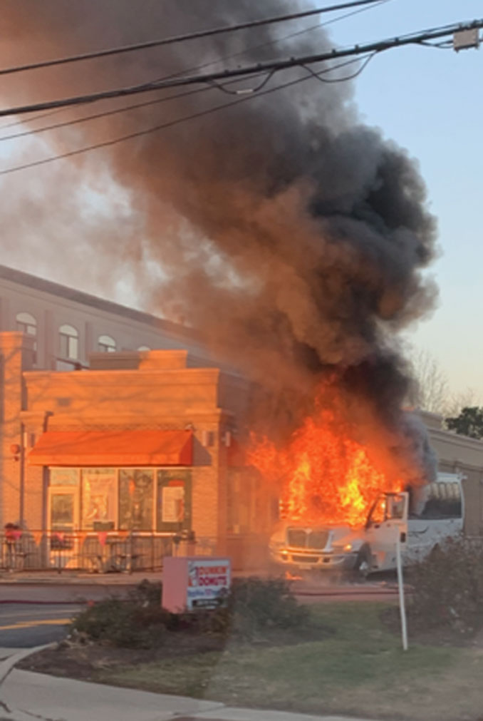 Mini-bus fire at Dunkin' Donuts on South Arlington Heights Road between Seegers Road and Algonquin Road in Arlington Heights