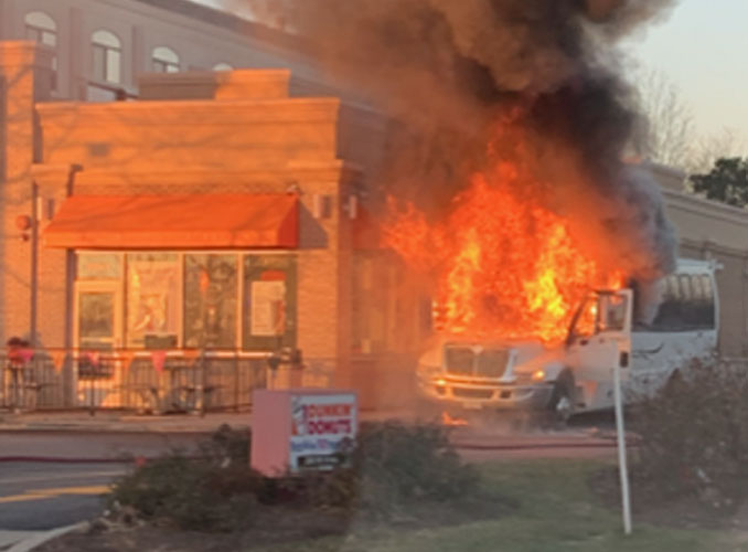 Mini-bus fire at Dunkin' Donuts on South Arlington Heights Road between Seegers Road and Algonquin Road in Arlington Heights