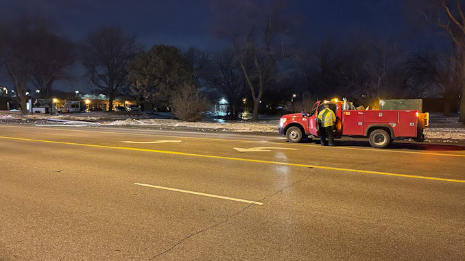 Public works on scene for light poles down from a car crash in the block of 700 West  Algonquin Road in Arlington Heights