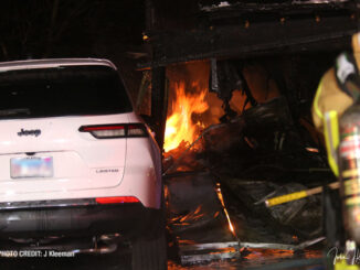 Flames showing in attached garage in Buffalo Grove that was destroyed by fire on January 1, 2022 (SOURCE: J Kleeman)