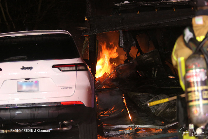 Flames showing in attached garage in Buffalo Grove that was destroyed by fire on January 1, 2022 (SOURCE: J Kleeman)