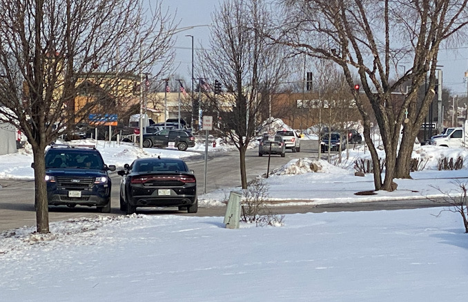 Arlington Heights police in the area of Buick GMC - Arlington Heights are a report of a commercial burglary and auto theft(s)