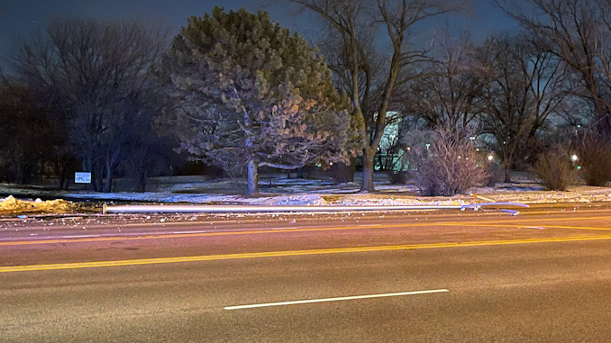 Second of two 50-foot aluminum light poles down in a westbound lane of Algonquin Road east of Meijer Drive in Arlington Heights