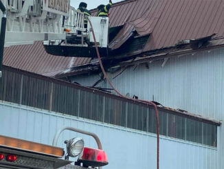 Hampshire firefighters inspecting warehouse structure after explosion inside (SOURCE: Hampshire Fire Protection District)