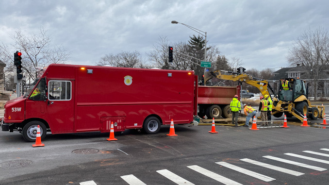 Water main repair work at Arlington Heights Road and Sigwalt Street in the middle of the intersection