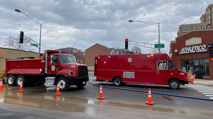 Water main repair work at Arlington Heights Road and Sigwalt Street in the middle of the intersection