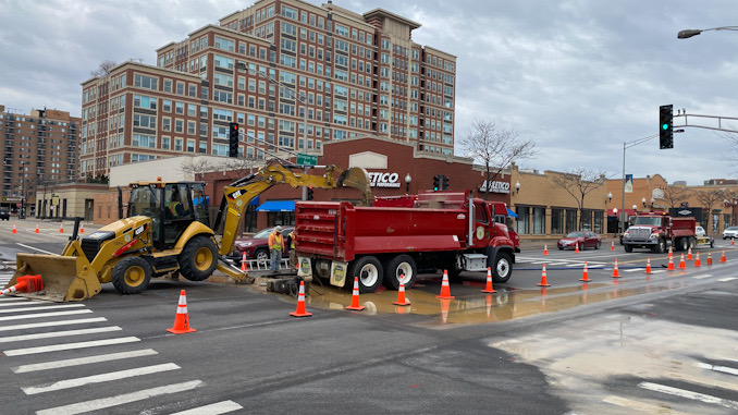 Water main repair work at Arlington Heights Road and Sigwalt Street in the middle of the intersection
