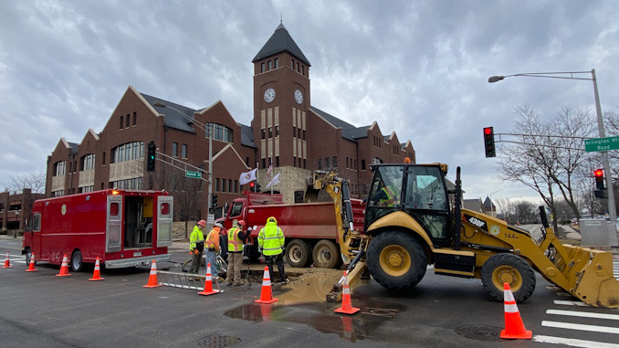 Water main repair work at Arlington Heights Road and Sigwalt Street in the middle of the intersection