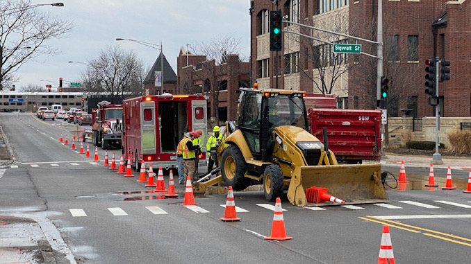 Water main repair work at Arlington Heights Road and Sigwalt Street in the middle of the intersection