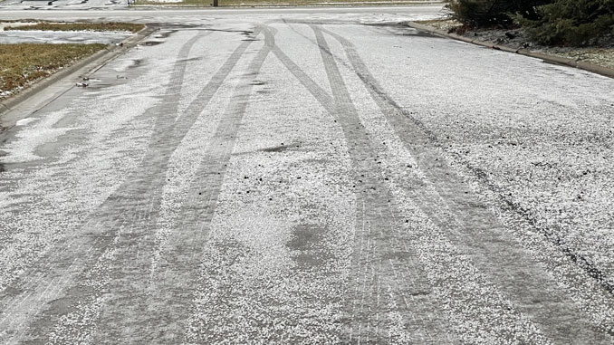 Hail-covered street on East Burr Oak Drive  just west of Arlington Heights Road and north of Hintz Road