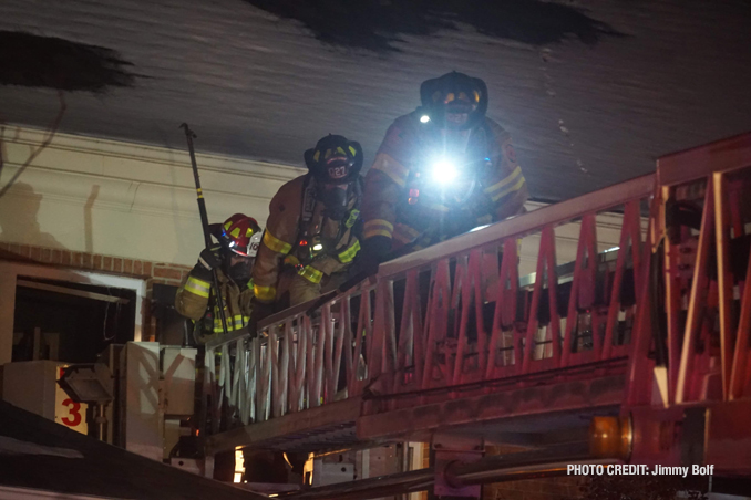 Firefighters on a main aerial at a house fire on Memory Lane in Lake Zurich (PHOTO CREDIT: Jimmy Bolf)