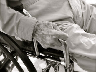 Aging, elderly senior in a wheelchair (PHOTO CREDIT: whitefieldink / pixaby)