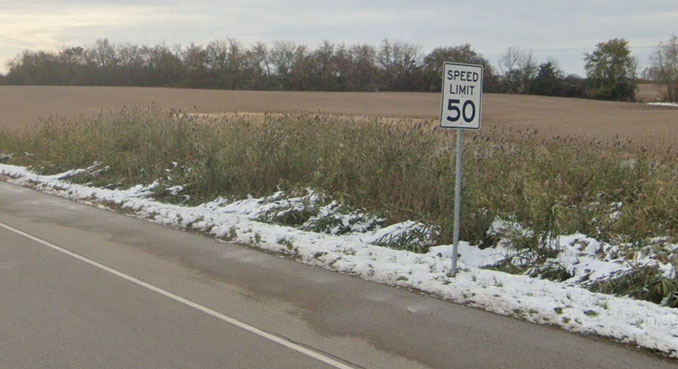 50 MPH Speed Limit sign on southbound Route 83 before crash scene location (Image captured November 2019 ©2022 Google)