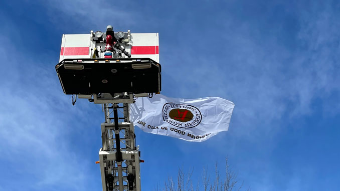 Village of Arlington Heights flag flying with Arlington Heights Fire Department RTL-1