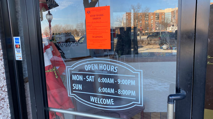 Dunton House Hours of Operation with Stop Worker Order sticker