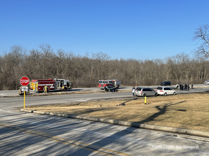 Rollover crash with fire at Route 120 and River Road in Waukegan (PHOTO CREDIT: Max Weingardt)