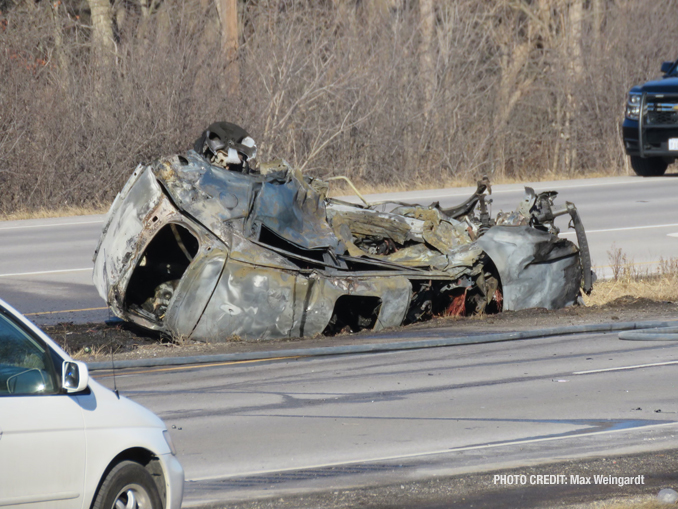 Rollover crash with fire at Route 120 and River Road in Waukegan (PHOTO CREDIT: Max Weingardt)