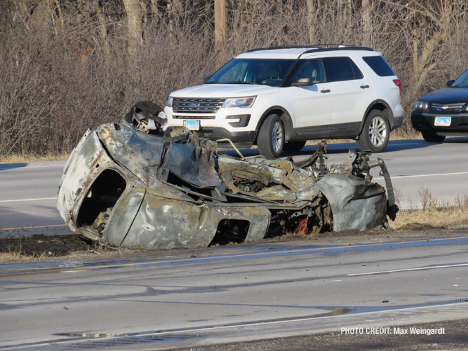 Rollover crash with fire at Route 120 and River Road in Waukegan (PHOTO CREDIT: Max Weingardt)