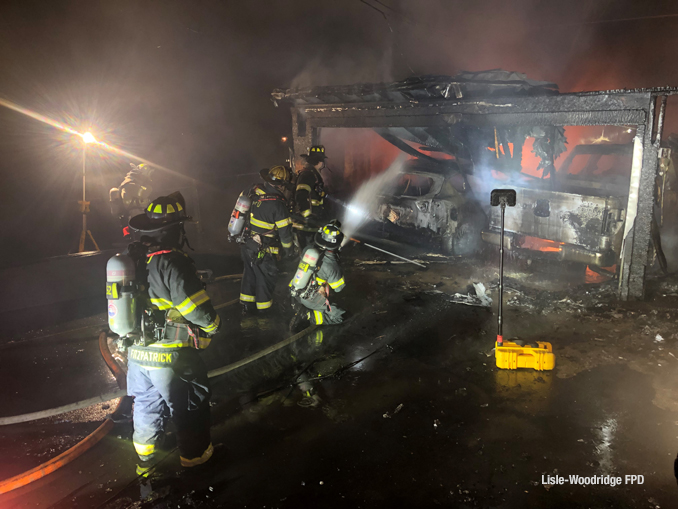 Two vehicles destroyed along with a detached garage in an early morning fire in Woodridge Monday, March 14, 2022 (SOURCE: Woodridge Fire Protection District)