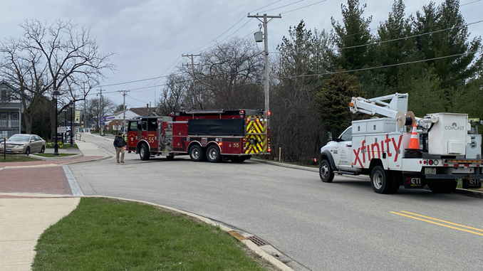 Long Grove firefighters on the scene with Comcast and ComEd after a fire involving a utility police on Robert Parker Coffin Road northeast of Old McHenry Road in Long Grove