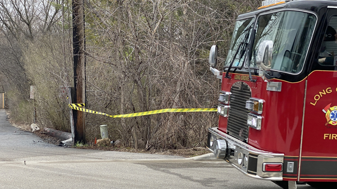 Long Grove firefighters on the scene with Comcast and ComEd after a fire involving a utility police on Robert Parker Coffin Road northeast of Old McHenry Road in Long Grove