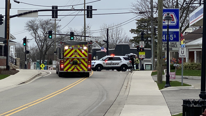 A Lake County Sheriff's deputy blocked Robert Parker Coffin Road at Old McHenry Road Wednesday when a utility pole caught fire