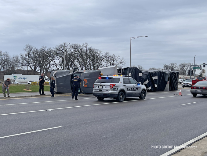 Rollover flatbed semi-trailer truck at Lake Cook Road and Hicks Road on Friday, April 22, 2022 (PHOTO CREDIT: Max Weingardt)