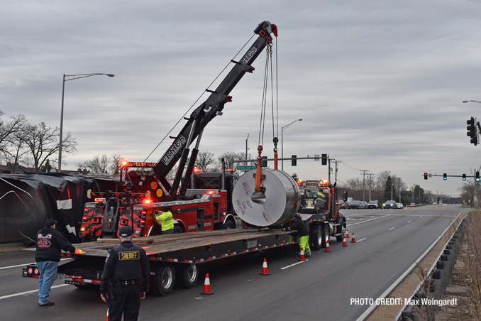 Rollover flatbed semi-trailer truck at Lake Cook Road and Hicks Road on Friday, April 22, 2022 (PHOTO CREDIT: Max Weingardt)