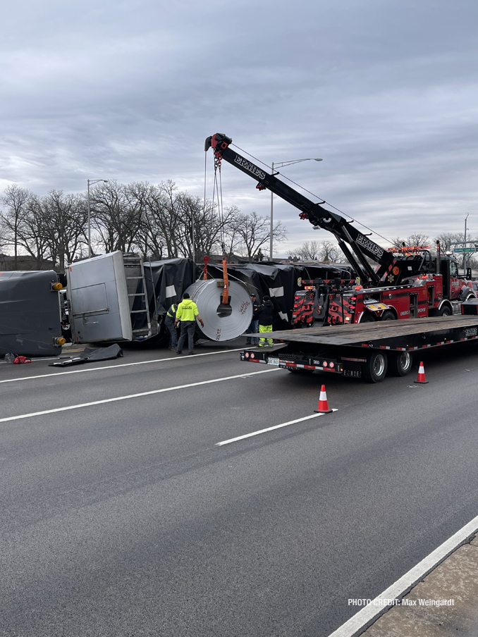 Rollover flatbed semi-trailer truck at Lake Cook Road and Hicks Road on Friday, April 22, 2022 (PHOTO CREDIT: Max Weingardt)