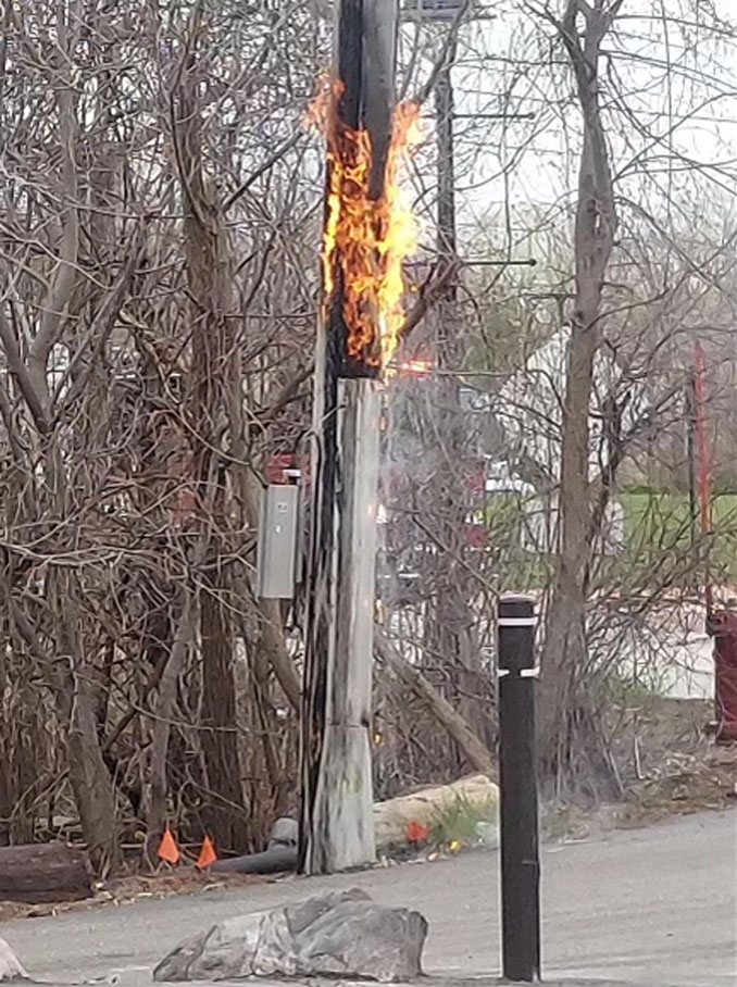 Utility pole fire on the north side of Robert Parker Coffin Road (PHOTO CREDIT: Scott Wallach)